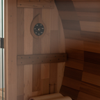 Wooden sauna with a digital clock on the wall